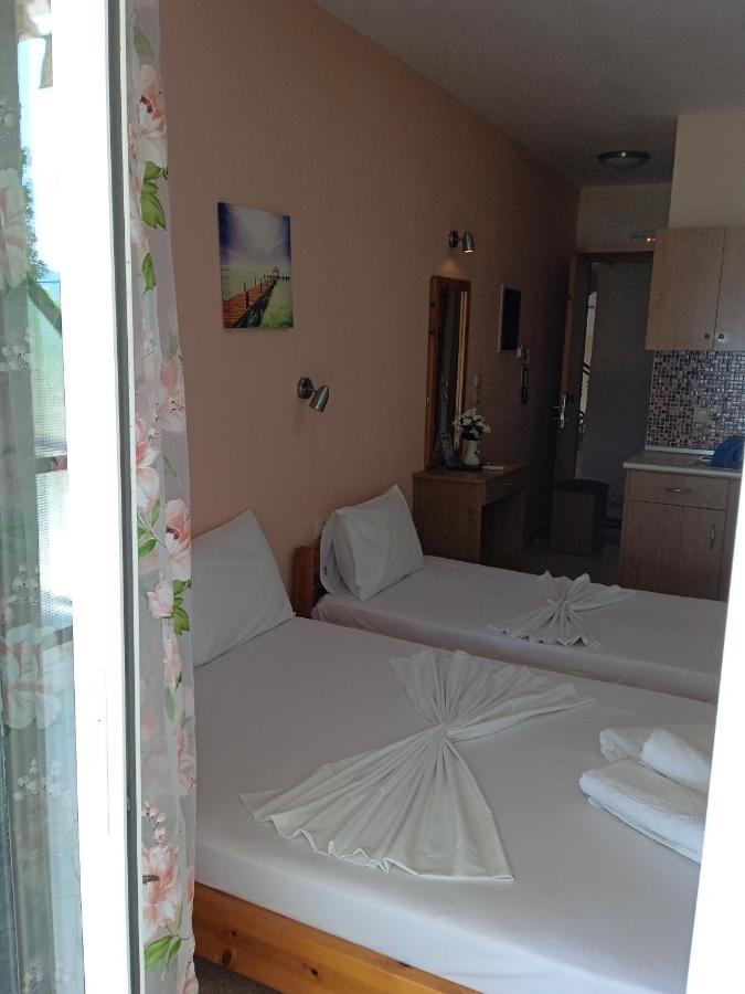 Poseidon Rooms Nea Vrasna Bagian luar foto